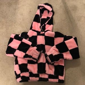 black and pink checkered puffer jacket